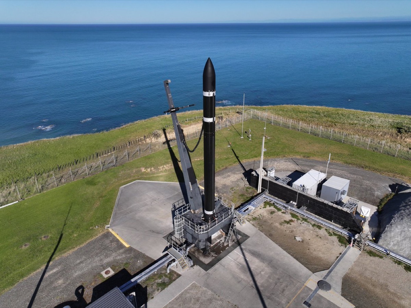 Rocket Lab's Electron on the pad at Launch Complex 1 in Mahia, New Zealand, the small-lift rocket the company started with before climbing toward medium-lift.